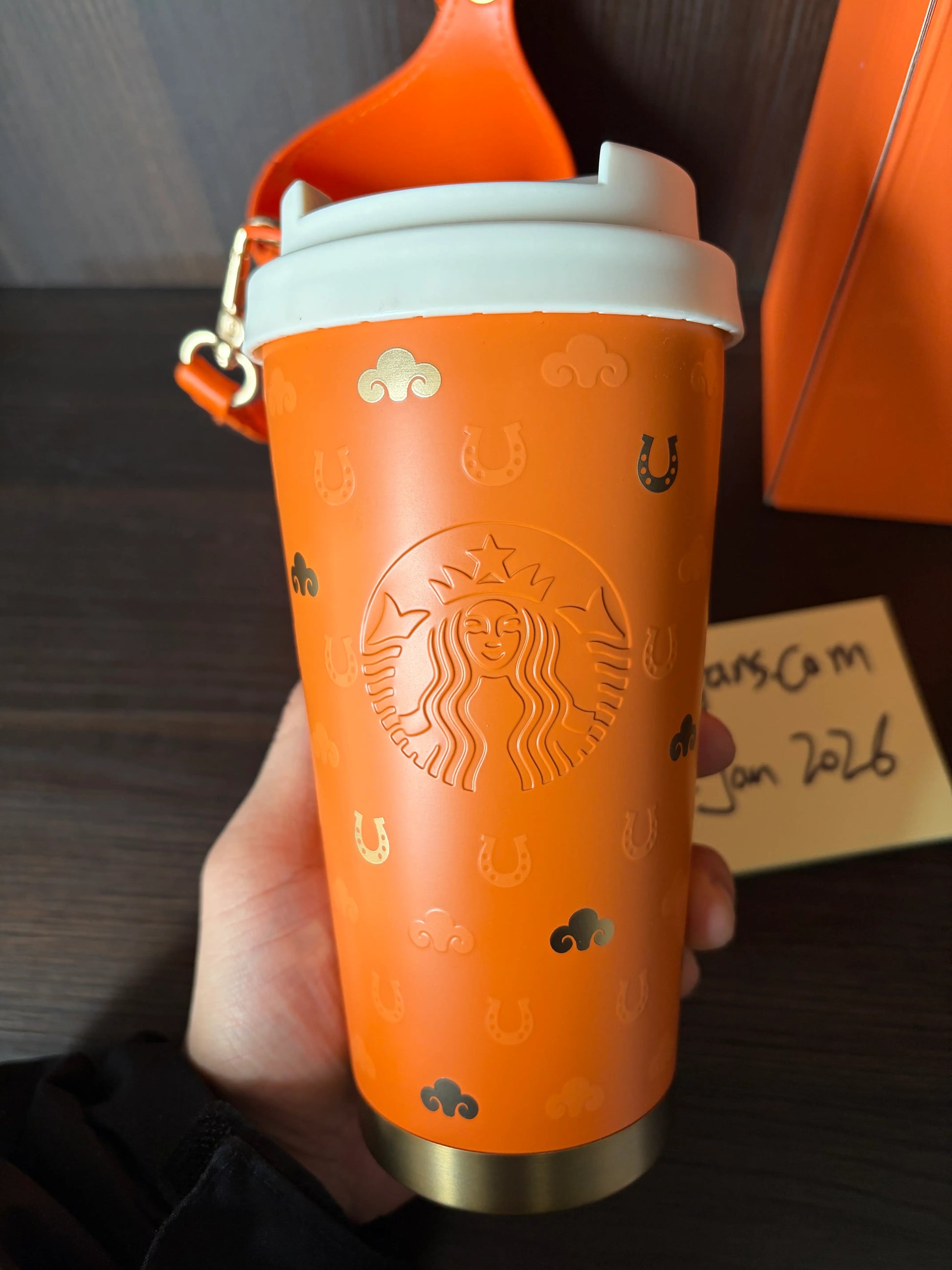 tarbucks 2026 China New Year of Horse tabletop cup in hand