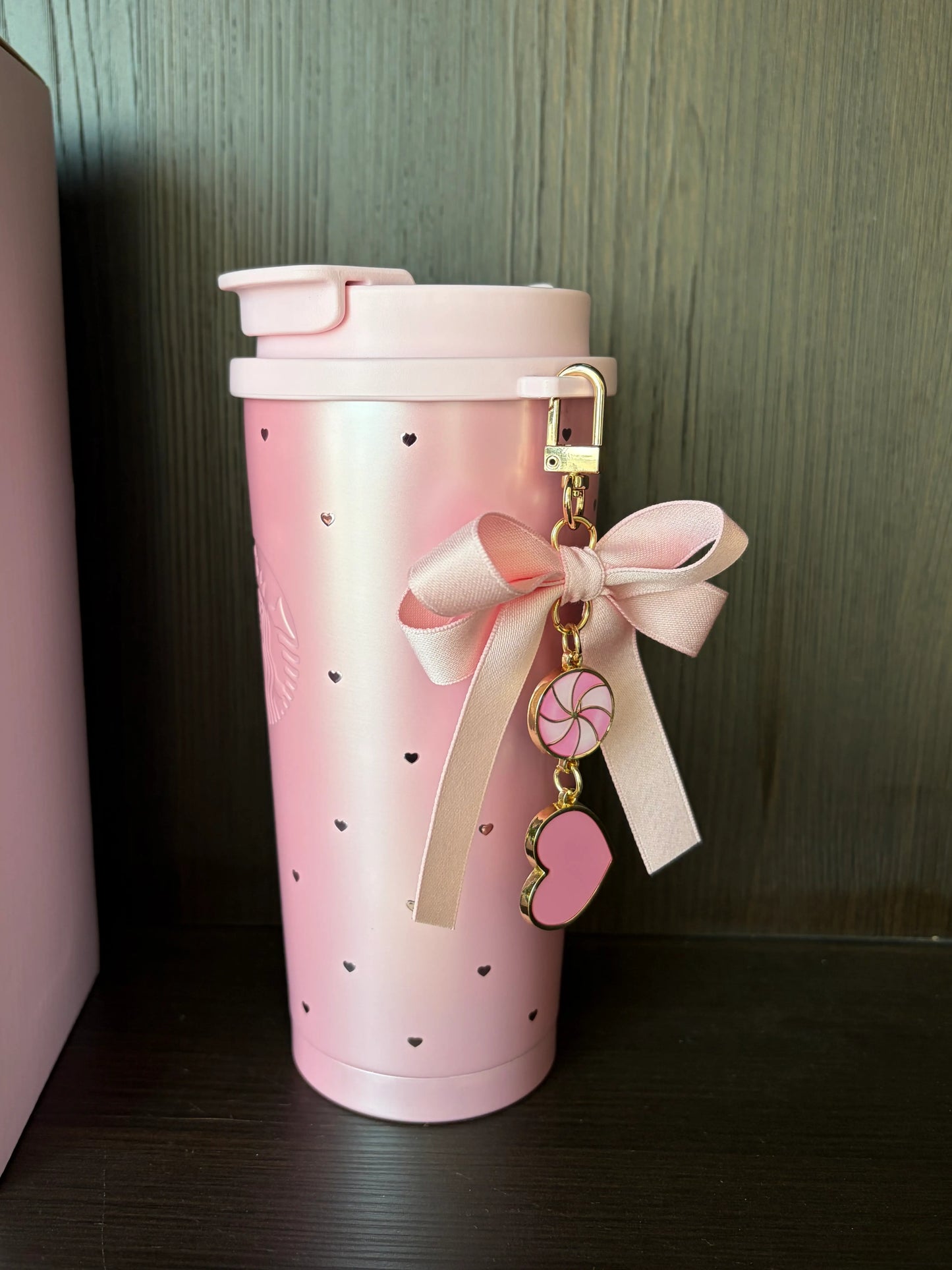 Detail close-up of Starbucks 2026 China Valentine’s Puffy Duck pink stainless steel cup texture