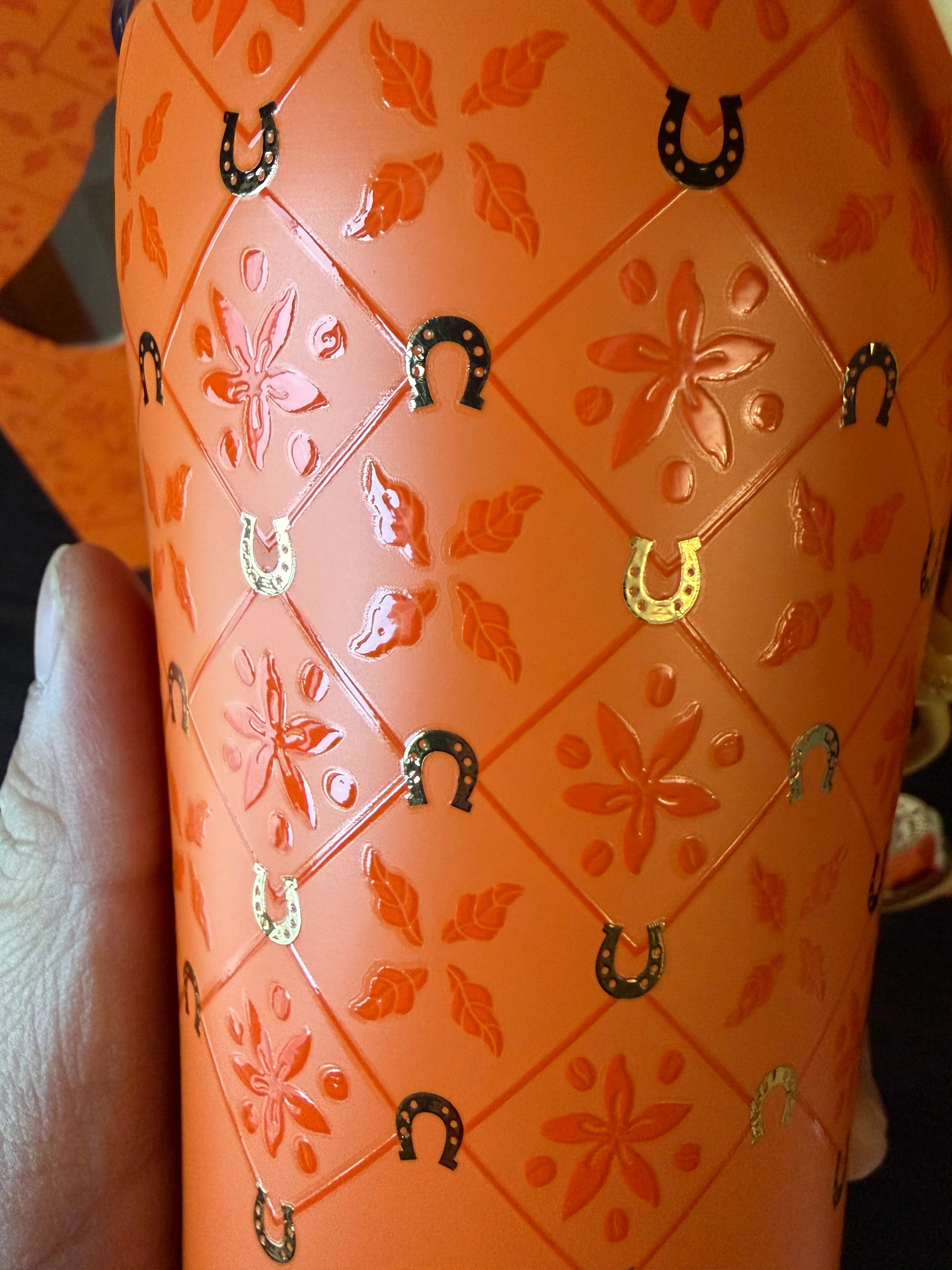 Detail of Year of the Horse pattern on Starbucks stainless steel tumbler